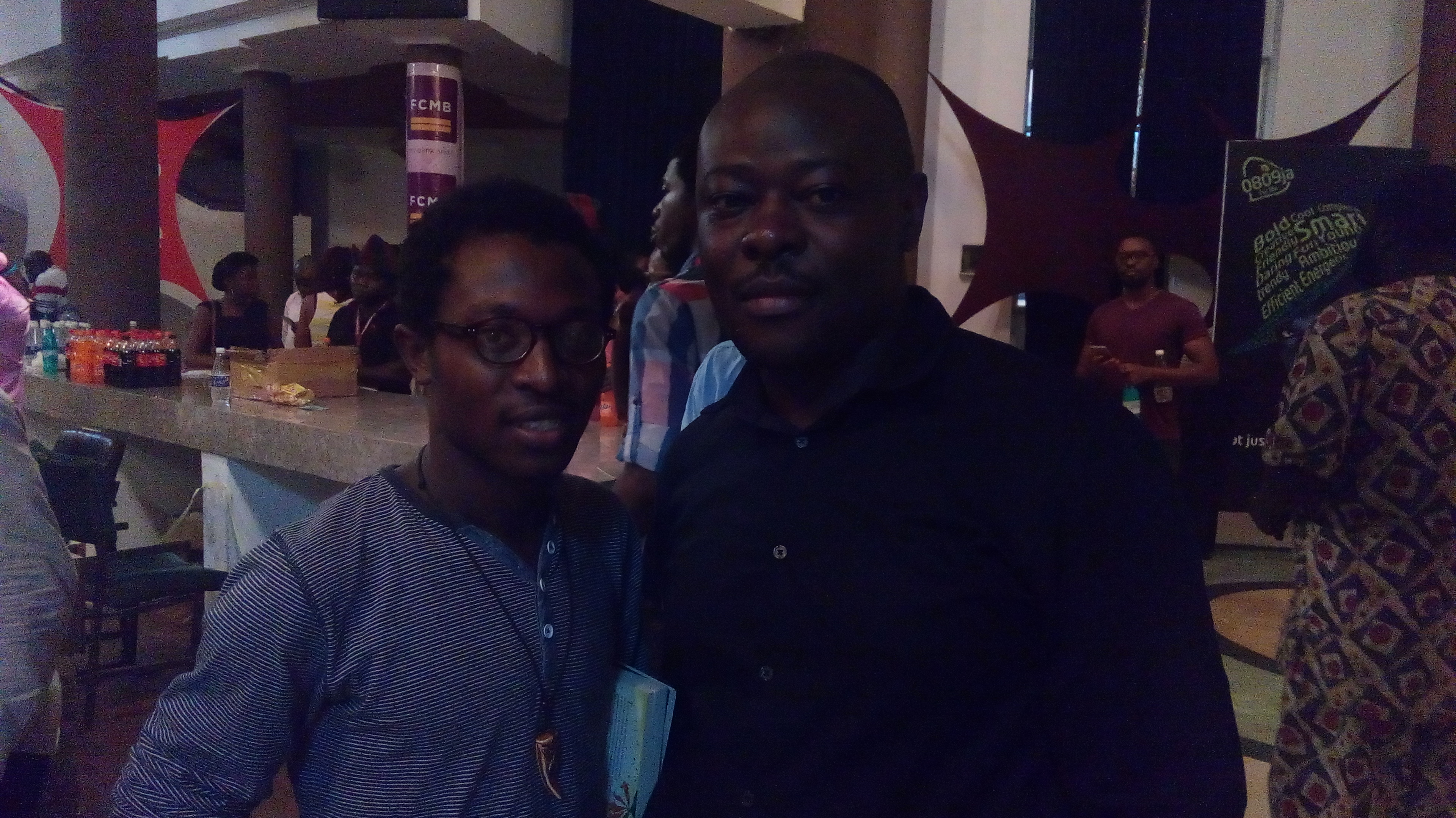 Samuel Olatunji with Helon Habila